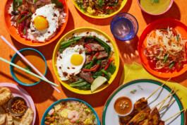 An overhead shot of a colorful palette of Thai food. 
