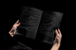 An interior spread of a magazine showing a text-only advertisement for JP Morgan's payment system. 